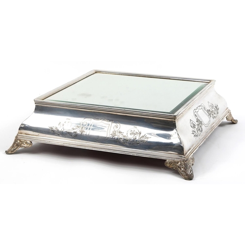 348 - Square silver plated wedding cake stand with mirrored top housed in a wooden box, the stand 13cm H x... 