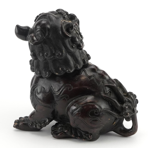 103 - Chinese patinated bronze qilin incense burner with hinged head, 16.5cm high