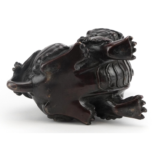 103 - Chinese patinated bronze qilin incense burner with hinged head, 16.5cm high