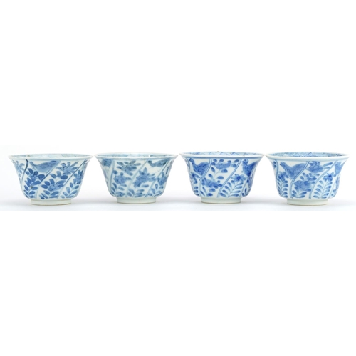 25 - Set of four Chinese blue and white porcelain bowls hand painted with a chicken and flowers, blue rin... 