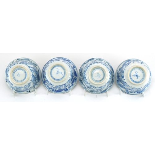 25 - Set of four Chinese blue and white porcelain bowls hand painted with a chicken and flowers, blue rin... 