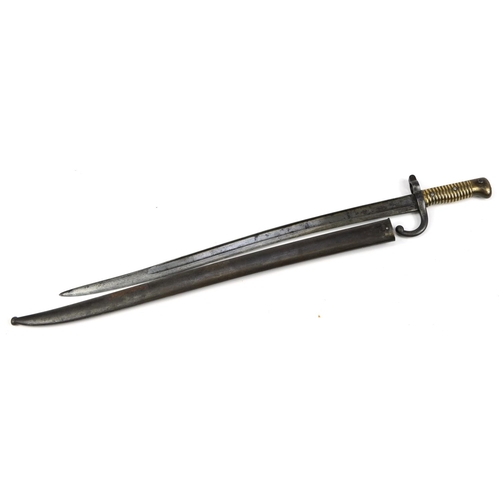 697 - French military interest long bayonet with steel blade, various impressed marks, 71cm in length