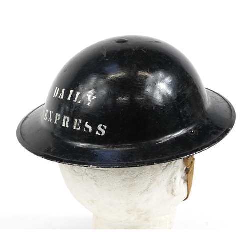 680 - Military interest Daily Express press tin helmet with liner