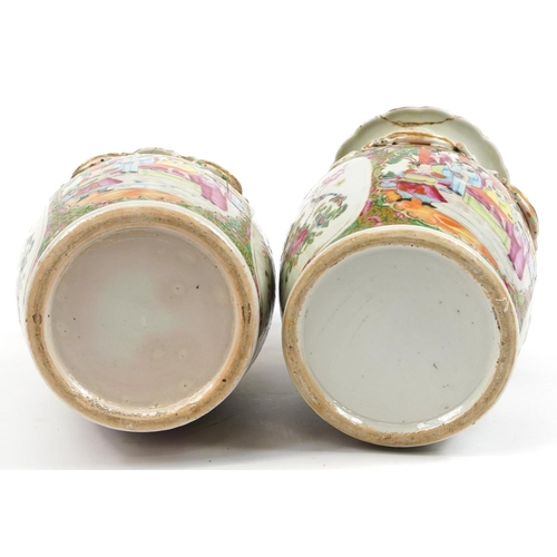 180 - Pair of Chinese Canton porcelain vases with twin handles, each hand painted in the famille rose pale... 