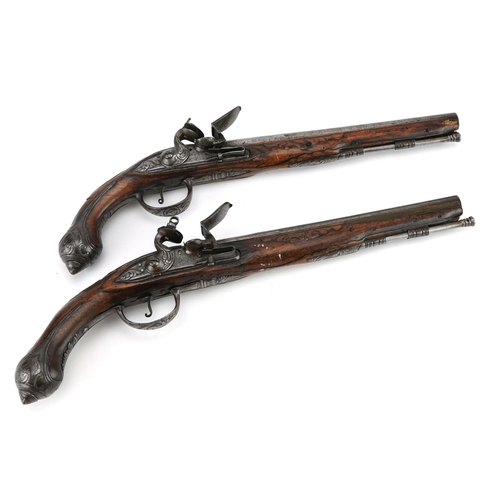 688 - Pair of 19th century flintlock pistols with foliate barrel and mounts, the barrels engraved Lazaro L... 