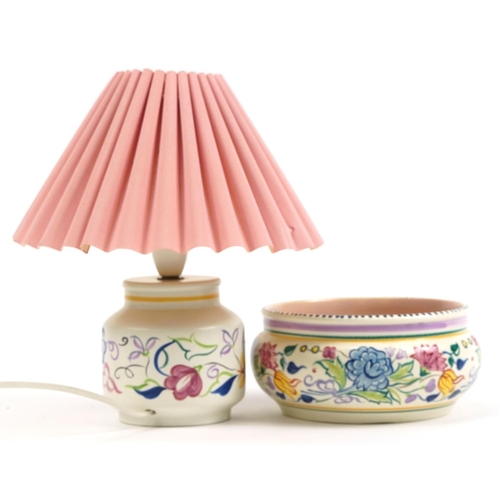 1195 - Poole Pottery table lamp with shade and bowl, each hand painted with flowers, the largest 29cm high