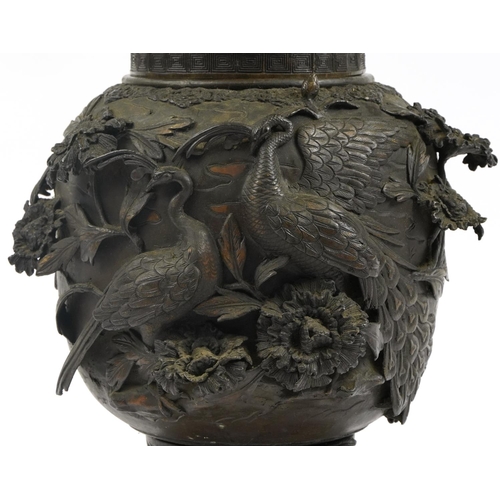 101 - Large Japanese patinated bronze two section vase cast in relief with cranes and mythical figures amo... 