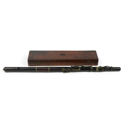7 - Boosey & Sons, Victorian rosewood four piece flute housed in a velvet lined mahogany case with R S P... 