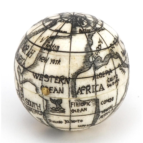 1202 - Naval interest carved bone pocket globe, 4cm in diameter