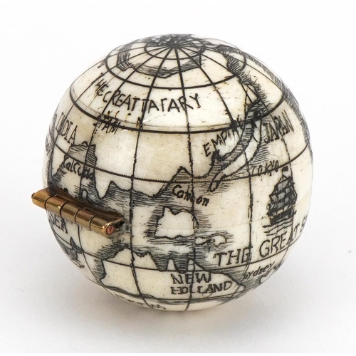 1202 - Naval interest carved bone pocket globe, 4cm in diameter