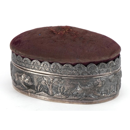 2683 - Anglo Indian unmarked silver jewel box with pincushion lid embossed with a hunter and wild game, 10.... 