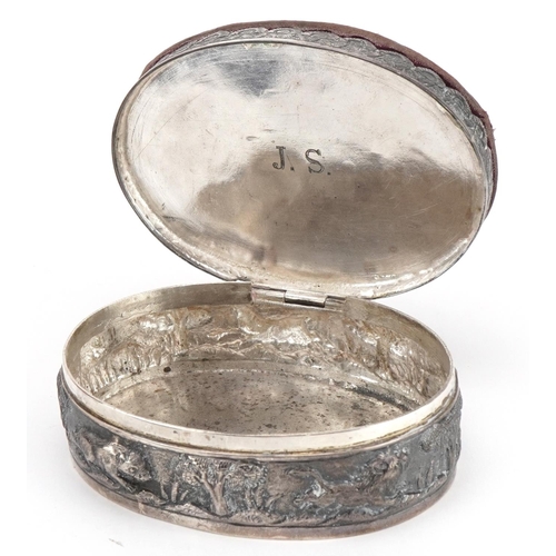 2683 - Anglo Indian unmarked silver jewel box with pincushion lid embossed with a hunter and wild game, 10.... 