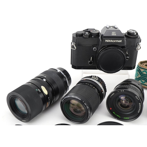 415 - Nikkormat EL camera with four lenses comprising Tamron 90mm, Tokina 17mm, Nikkor 55mm and Kikkor 35-... 