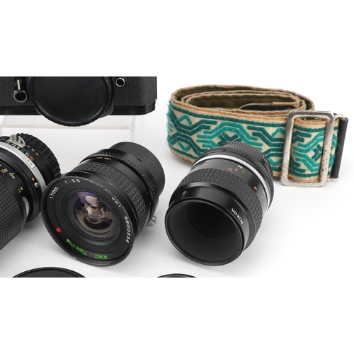 415 - Nikkormat EL camera with four lenses comprising Tamron 90mm, Tokina 17mm, Nikkor 55mm and Kikkor 35-... 