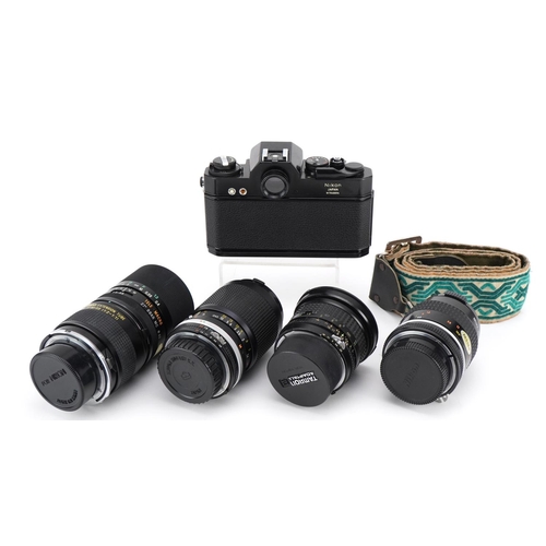 415 - Nikkormat EL camera with four lenses comprising Tamron 90mm, Tokina 17mm, Nikkor 55mm and Kikkor 35-... 