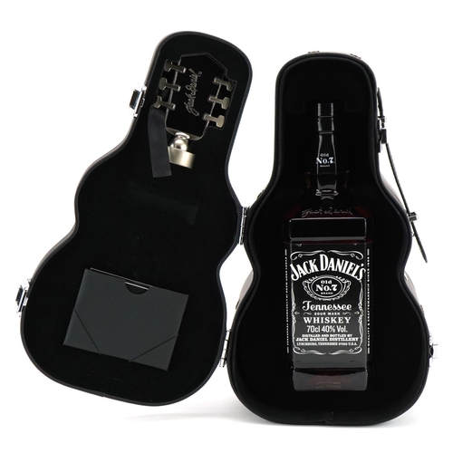 1189 - 70cl bottle of Jack Daniels whisky housed in a Music to Our Ears case in the form of a guitar, 31cm ... 