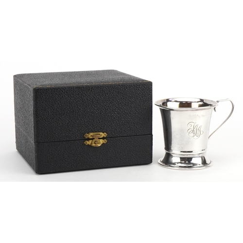 2690 - W I Broadway & Co, Elizabeth II silver christening tankard with gilt interior housed in a fitted box... 