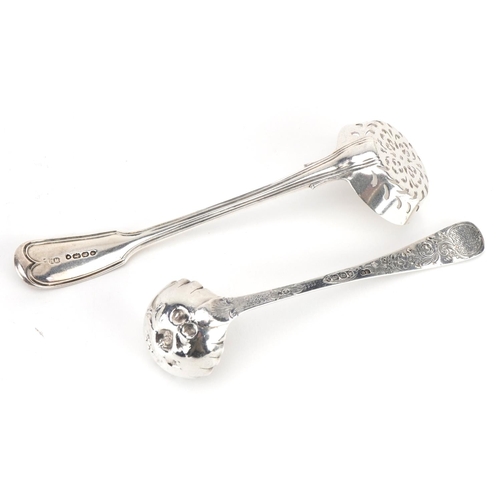 2700 - Two Victorian spoons comprising one embossed with fruit and a sifting example, one London 1863, the ... 