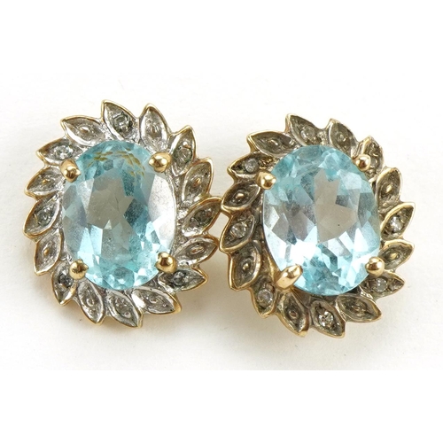 2093 - Pair of 9ct two tone gold blue topaz and diamond cluster stud earrings, 1.4cm high, 3.0g