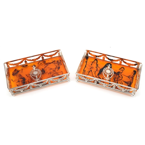 1257 - Pair of silver plated and faux tortoiseshell gallery trays with pierced swag decoration, 22cm wide