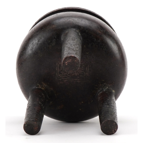 104 - Chinese patinated bronze tripod censer with twin handles and white metal inlay, decorated with birds... 