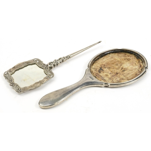 2757 - Silver hand mirror with floral decoration together with a silver mirror back, the mirror back, Birmi... 