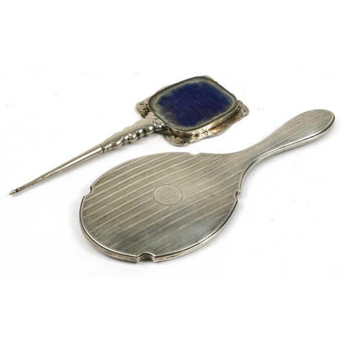 2757 - Silver hand mirror with floral decoration together with a silver mirror back, the mirror back, Birmi... 