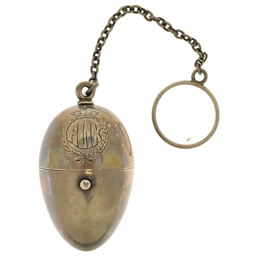 2777 - Unmarked silver vinaigrette in the form of an egg with pierced grille and gilt interior, 5cm high, 2... 