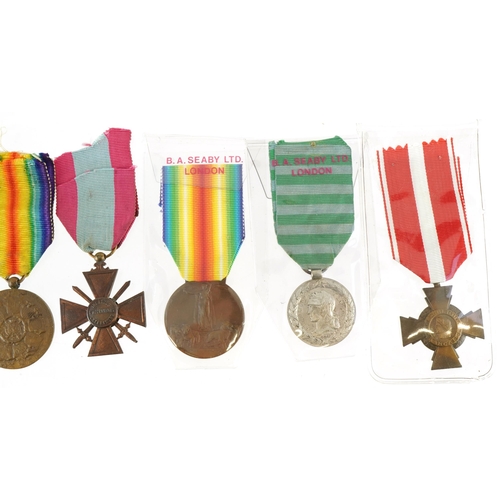 676 - Seven French military interest medals including Madagascar Commemorative and Madagascar medal