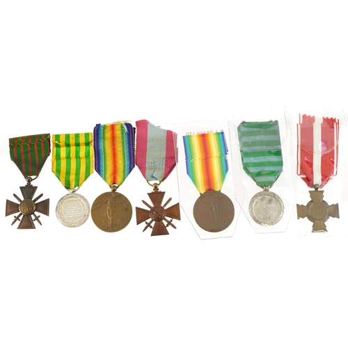 676 - Seven French military interest medals including Madagascar Commemorative and Madagascar medal