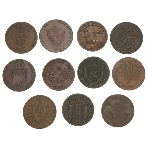 554 - Eleven 18th century half penny tokens including Province of Nova Scotia and value two quartos