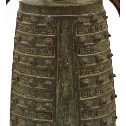 186 - Chinese archaic style patinated metal bell design twin table lamp with hardwood mounts, 39.5cm high