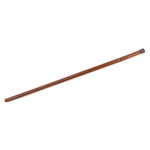 346 - Wooden prohibition walking stick housing a glass vessel, 89cm in length