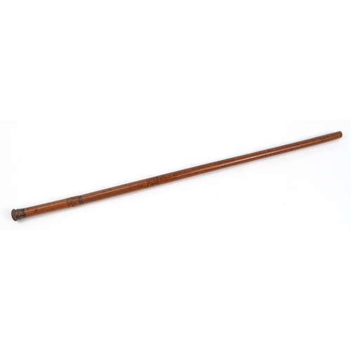 346 - Wooden prohibition walking stick housing a glass vessel, 89cm in length