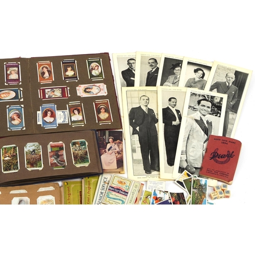 597 - Collection of cigarette cards, some arranged in albums including John Player & Sons Battalions, John... 