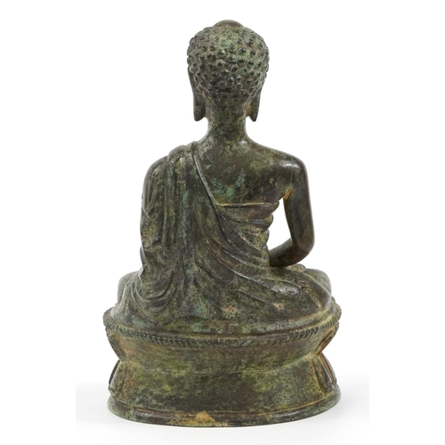 105 - Chino Tibetan patinated bronze figure of seated Buddha, 28.5cm high