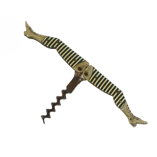 Antique German celluloid legs design corkscrew with steel worm, 13cm wide when open