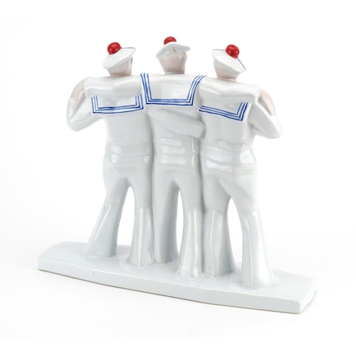 250 - Art Deco style porcelain figure group of three sailors, 32cm wide