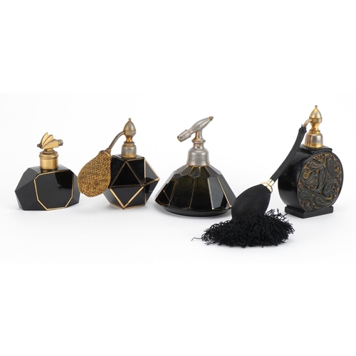 124 - Four French Art Deco black glass atomisers including three with gilt decoration, one stamped France ... 