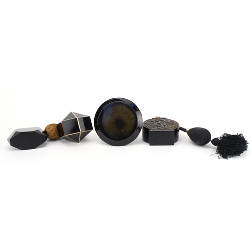 124 - Four French Art Deco black glass atomisers including three with gilt decoration, one stamped France ... 