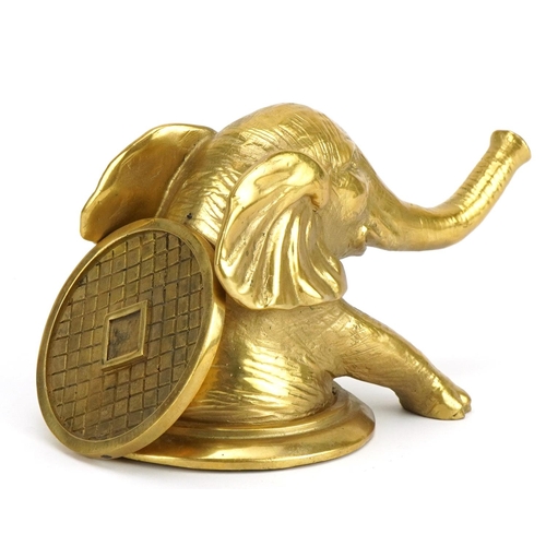 334 - 19th century gilt metal paperweight in the form of an elephant, 17cm in length