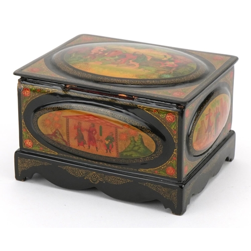 303 - Russian lacquered casket with hinged lid finely hand painted with five panels of merry figures withi... 