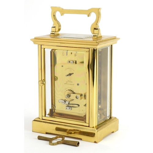 112 - Woodford, brass cased eight day carriage clock with bevelled glass panels, the dial having Roman num... 