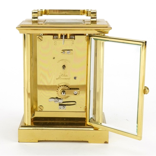 112 - Woodford, brass cased eight day carriage clock with bevelled glass panels, the dial having Roman num... 