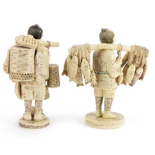 331 - Pair of Japanese ivorine okimonos of street sellers including a fisherman, 20.5cm high