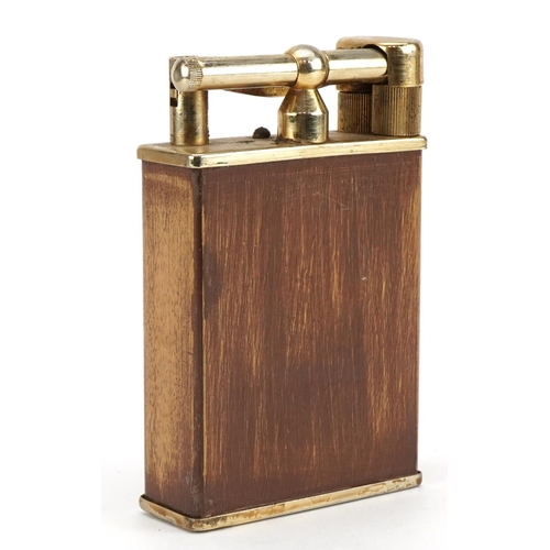 69 - Vintage wooden Penguin gas Argus lighter with gilt metal mounts, 14.5cm high