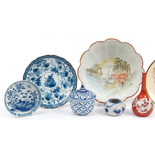 1229 - Chinese and Japanese ceramics including a pair of blue and white dishes hand painted with flowers an... 