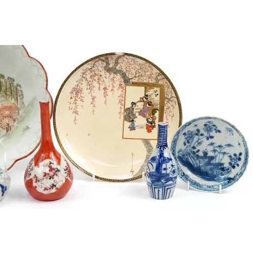 1229 - Chinese and Japanese ceramics including a pair of blue and white dishes hand painted with flowers an... 