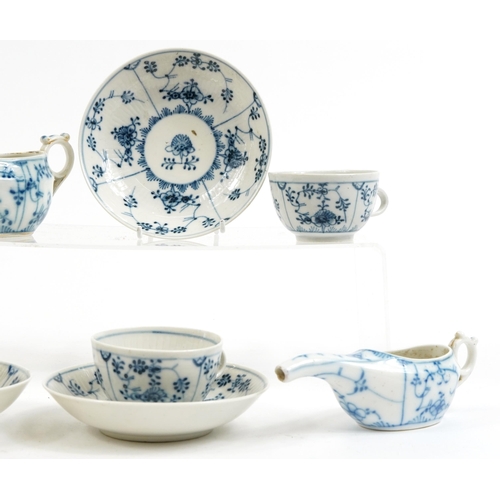 1219 - Continental blue and white porcelain comprising three cups and saucers and two invalid feeders, the ... 