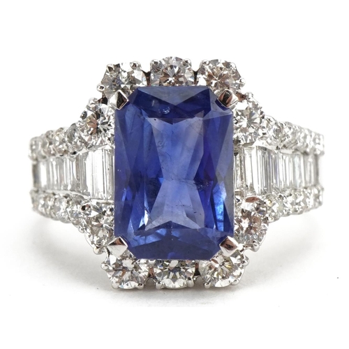 2097 - 18ct white gold sapphire and diamond cluster ring with diamond set shoulders, total sapphire weight ... 